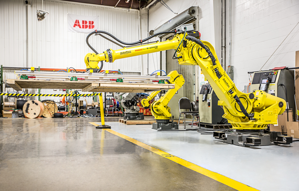 material handling robot lifting a wood sign panel 物料搬运机器人提升木材面板标志